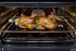 Espetos giratórios: permitem assar alimentos maiores de forma mais homogênea ao usar o grill churrasqueira em ambos os fornos principal e auxiliar.